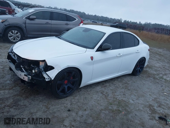 2017 Alfa Romeo Giulia Ti z VIN ZARFAECN2H7539370, wystawiony jako IAAI lot #41762612 z przebiegiem 100 629 mil mil oraz . Historia ofert i sprzedaży dostępna na DreamBid. Obrazek 2.