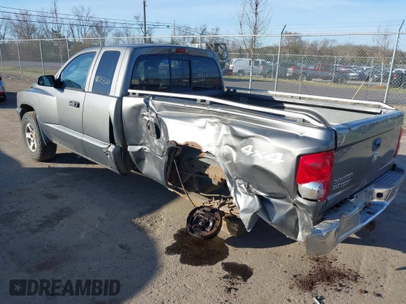 2005 Dodge Dakota SLT with VIN 1D7HW42N75S220495, listed as a IAAI auction lot 41825320 with 123,085 mi miles and . Bid and sale history available at DreamBid. Image 3.