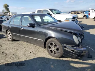 2002 Mercedes-Benz E-Class with VIN WDBJF65J72B424966, listed as a Copart auction lot 89323505 with 199,185 mi miles and Salvage Title. Bid and sale history available at carsss.com. Image 4.