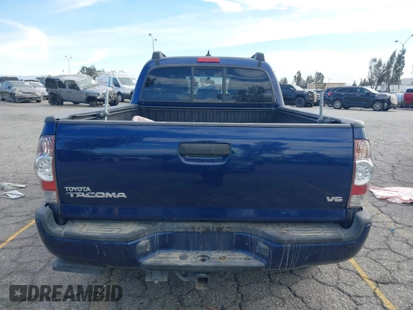 2015 Toyota Tacoma with VIN 3TMMU4FN0FM077148, listed as a IAAI auction lot 41274934 with 112,617 mi miles and . Bid and sale history available at DreamBid. Image 17.