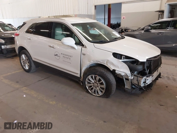2017 Cadillac XT5 FWD with VIN 1GYKNARS7HZ121596, listed as a IAAI auction lot 41825879 with 82,023 mi miles and . Bid and sale history available at DreamBid. Image 1.