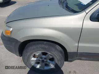 2005 Ford Escape XLT с VIN 1FMCU03165DA08296, выставлен на аукционе IAAI как лот 41677892 с пробегом 255 431 миль миль и . История ставок и продаж доступна на DreamBid. Изображение 6.