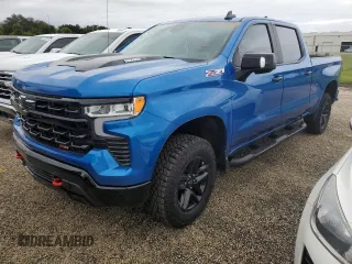 2023 Chevrolet Silverado 1500 LT Trail Boss with VIN 3GCUDFE89PG291160, listed as a Copart auction lot 74374664 with 5,757 mi miles and Salvage Title. Bid and sale history available at DreamBid. Image 1.