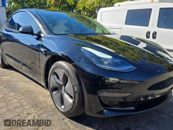 2021 Tesla Model 3 Standard Range Plus with VIN 5YJ3E1EA1MF871146, listed as a Copart auction lot 42027405 with 72,492 mi miles and Salvage Title. Bid and sale history available at DreamBid. Image 1.
