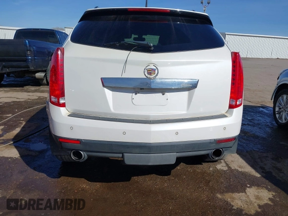 2014 Cadillac SRX Performance Collection with VIN 3GYFNCE31ES646075, listed as a IAAI auction lot 41856378 with 172,379 mi miles. Bid and sale history available at carsss.com. Image 16.