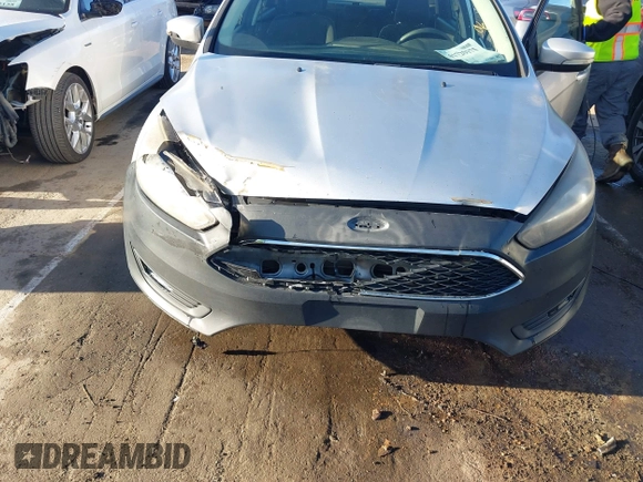 2017 Ford Focus SEL with VIN 1FADP3H21HL336597, listed as a IAAI auction lot 41729173 with 166,140 mi miles. Bid and sale history available at carsss.com. Image 6.