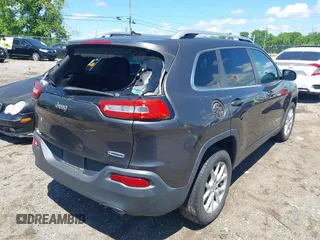 2014 Jeep Cherokee Latitude with VIN 1C4PJLCS0EW297415, listed as a IAAI auction lot 42198645 with 160,268 mi miles. Bid and sale history available at carsss.com. Image 4.