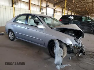 2006 Kia Spectra EX with VIN KNAFE121465332510, listed as a Copart auction lot 77211974 with 148,964 mi miles and Salvage Title. Bid and sale history available at carsss.com. Image 4.