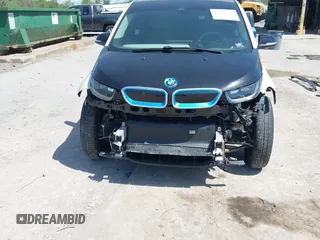 2015 BMW i3 z VIN WBY1Z4C58FV501754, wystawiony jako IAAI lot #42220253 z przebiegiem 59 022 mil mil oraz . Historia ofert i sprzedaży dostępna na DreamBid. Obrazek 6.