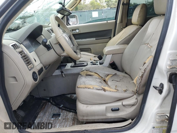 2009 Mercury Mariner Premier с VIN 4M2CU87709KJ14823, выставлен на аукционе Copart как лот 60121965 с пробегом Не указан миль и Списание • Salvage title. История ставок и продаж доступна на DreamBid. Изображение 7.