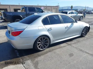 2008 BMW 5 Series 550i with VIN WBANW53538CT52019, listed as a IAAI auction lot 41550107 with 192,163 mi miles. Bid and sale history available at carsss.com. Image 4.