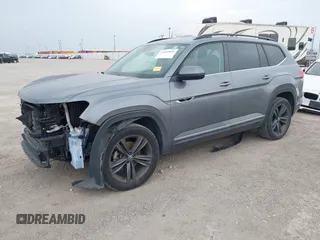 2021 Volkswagen Atlas SE with VIN 1V2NR2CA4MC529207, listed as a IAAI auction lot 42265026 with 53,185 mi miles and . Bid and sale history available at DreamBid. Image 2.