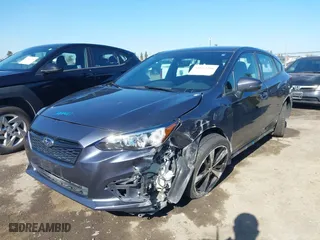 2017 Subaru Impreza Sport with VIN 4S3GTAK61H1731989, listed as a IAAI auction lot 41819366 with 93,369 mi miles. Bid and sale history available at carsss.com. Image 2.