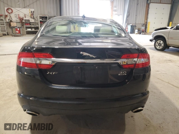 2013 Jaguar XF SC with VIN SAJWJ0EF9D8S92356, listed as a Copart auction lot 54209125 with 105,600 mi miles and Salvage Title. Bid and sale history available at DreamBid. Image 6.