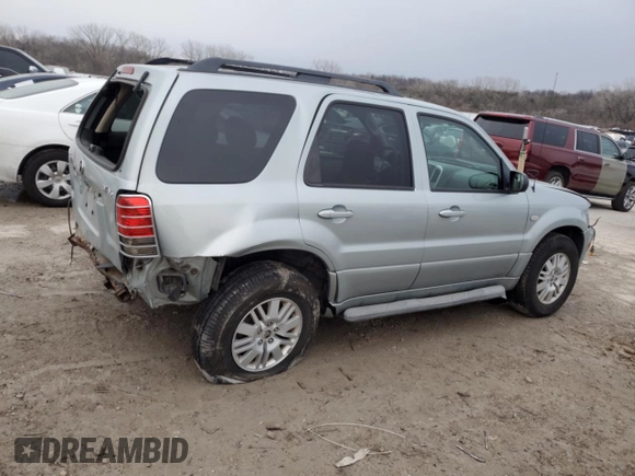 2005 Mercury Mariner Luxury z VIN 4M2CU57105DJ33266, wystawiony jako Copart lot #87002044 z przebiegiem 164 313 mil mil oraz Szkody całkowita. Historia ofert i sprzedaży dostępna na DreamBid. Obrazek 3.