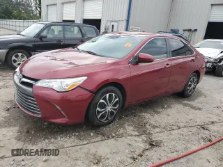 2015 Toyota Camry XLE with VIN 4T1BF1FK0FU894097, listed as a Copart auction lot 73964744 with 210,289 mi miles and Salvage Title. Bid and sale history available at DreamBid. Image 1.