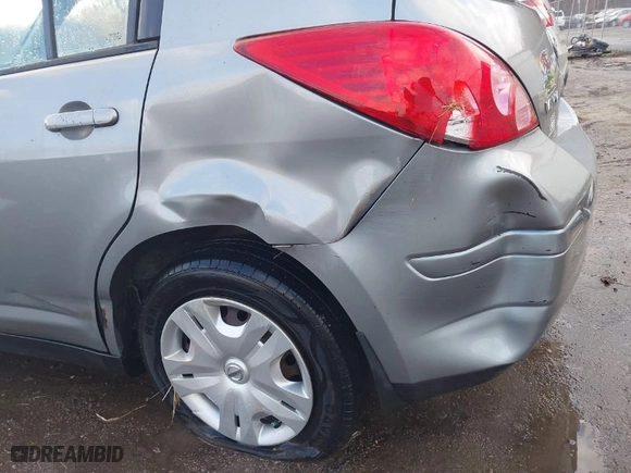 2010 Nissan Versa 1.8 S with VIN 3N1BC1CP3AL356366, listed as a IAAI auction lot 41182930 with 174,061 mi miles. Bid and sale history available at carsss.com. Image 6.