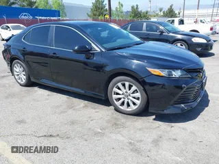 2020 Toyota Camry LE with VIN 4T1C11AKXLU955851, listed as a IAAI auction lot 41996827 with 59,008 mi miles and . Bid and sale history available at carsss.com. Image 1.