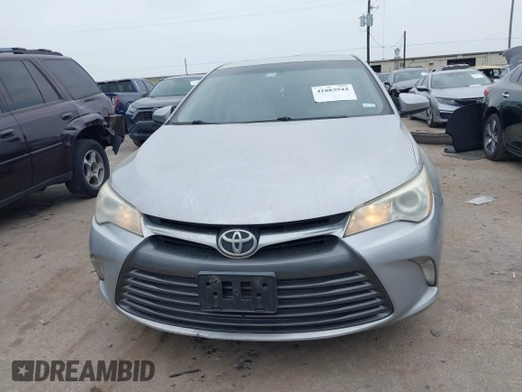 2015 Toyota Camry XLE with VIN 4T4BF1FKXFR472201, listed as a IAAI auction lot 41883944 with 143,296 mi miles and . Bid and sale history available at DreamBid. Image 13.