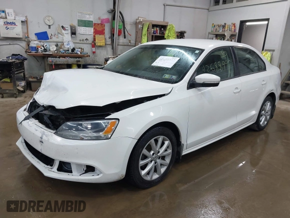 2012 Volkswagen Jetta SE z VIN 3VWDP7AJXCM075722, wystawiony jako IAAI lot #42688997 z przebiegiem 121 348 mil mil oraz . Historia ofert i sprzedaży dostępna na DreamBid. Obrazek 2.