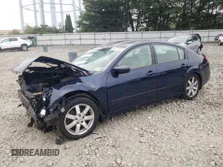 2005 Nissan Maxima 3.5 SL with VIN 1N4BA41E15C869631, listed as a Copart auction lot 74067494 with 71,779 mi miles and Salvage Title. Bid and sale history available at carsss.com. Image 1.