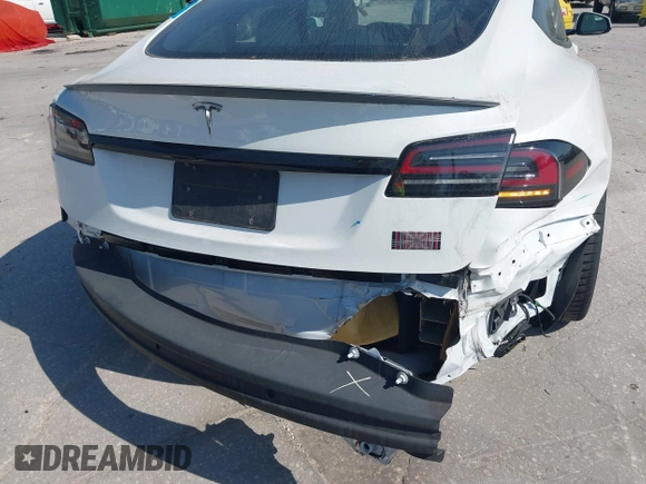 2022 Tesla Model S Plaid with VIN 5YJSA1E64NF484904, listed as a IAAI auction lot 41594464 with 25,299 mi miles and . Bid and sale history available at DreamBid. Image 18.