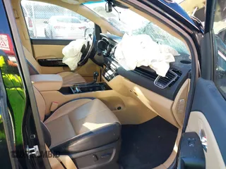 2016 Kia Sedona SX-L with VIN KNDME5C15G6176053, listed as a IAAI auction lot 41213512 with 137,299 mi miles. Bid and sale history available at carsss.com. Image 5.