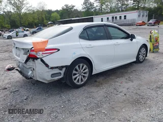 2018 Toyota Camry LE z VIN 4T1B11HK2JU096477, wystawiony jako IAAI lot #42043367 z przebiegiem 116 915 mil mil oraz . Historia ofert i sprzedaży dostępna na DreamBid. Obrazek 4.