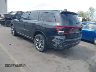 2015 Dodge Durango SXT with VIN 1C4RDJAGXFC796034, listed as a IAAI auction lot 42057983 with 159,108 mi miles and . Bid and sale history available at DreamBid. Image 3.