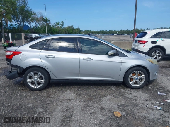 2013 Ford Focus SE with VIN 1FADP3F28DL217636, listed as a IAAI auction lot 42465123 with 187,088 mi miles and . Bid and sale history available at DreamBid. Image 14.