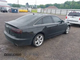 2012 Audi A6 Premium Plus with VIN WAUGGAFC2CN126317, listed as a IAAI auction lot 42407579 with 131,644 mi miles and . Bid and sale history available at DreamBid. Image 4.
