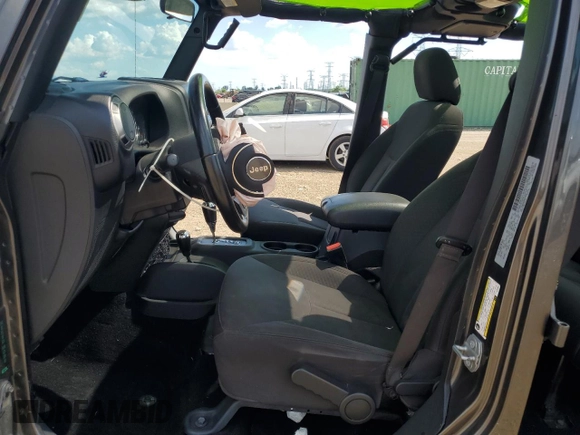 2017 Jeep Wrangler Unlimited Sport with VIN 1C4BJWDG8HL553697, listed as a Copart auction lot 63375785 with 83,573 mi miles and Salvage title. Bid and sale history available at DreamBid. Image 7.