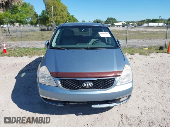 2014 Kia Sedona EX with VIN KNDMH4C70E6553732, listed as a IAAI auction lot 41812283 with 676,894 mi miles. Bid and sale history available at carsss.com. Image 6.