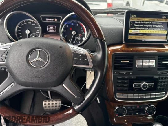 2013 Mercedes-Benz G 550 с VIN WDCYC3HF3DX211057, выставлен на аукционе Copart как лот 78868764 с пробегом 102 789 миль миль и Чистый • Clean title. История ставок и продаж доступна на DreamBid. Изображение 9.