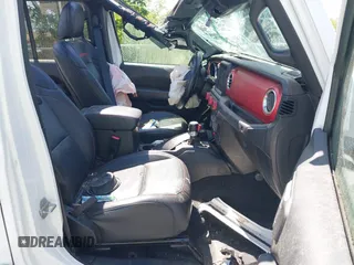 2020 Jeep Wrangler Unlimited Rubicon z VIN 1C4JJXFM5LW278740, wystawiony jako IAAI lot #42086112 z przebiegiem 93 658 mil mil oraz . Historia ofert i sprzedaży dostępna na DreamBid. Obrazek 5.