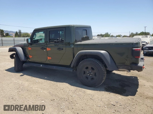 2023 Jeep Gladiator Mojave with VIN 1C6JJTEG9PL559331, listed as a Copart auction lot 62415345 with 22,091 mi miles and Salvage title. Bid and sale history available at DreamBid. Image 2.