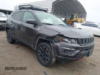 2019 Jeep Compass Trailhawk with VIN 3C4NJDDB1KT739938, listed as a IAAI auction lot 41411173 with 140,396 mi miles and . Bid and sale history available at carsss.com. Image 1.
