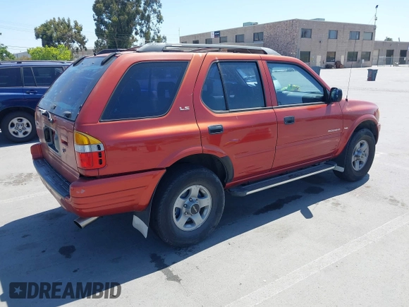 1999 Isuzu Rodeo S z VIN 4S2CK58WXX4346156, wystawiony jako IAAI lot #42328951 z przebiegiem 196 182 mil mil oraz . Historia ofert i sprzedaży dostępna na DreamBid. Obrazek 4.