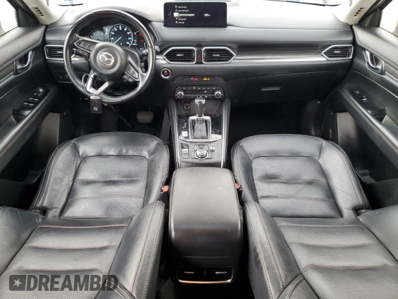 2021 Mazda CX-5 Grand Touring with VIN JM3KFADM8M1339008, listed as a Copart auction lot 49150115 with 144,851 mi miles and Salvage Title. Bid and sale history available at carsss.com. Image 8.