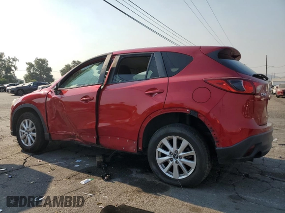 2014 Mazda CX-5 Touring with VIN JM3KE2CY0E0309845, listed as a Copart auction lot 62193734 with 97,878 mi miles and Salvage Title. Bid and sale history available at carsss.com. Image 2.