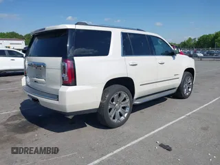 2015 GMC Yukon Denali with VIN 1GKS1CKJ3FR230797, listed as a IAAI auction lot 41977294 with 174,633 mi miles. Bid and sale history available at carsss.com. Image 4.