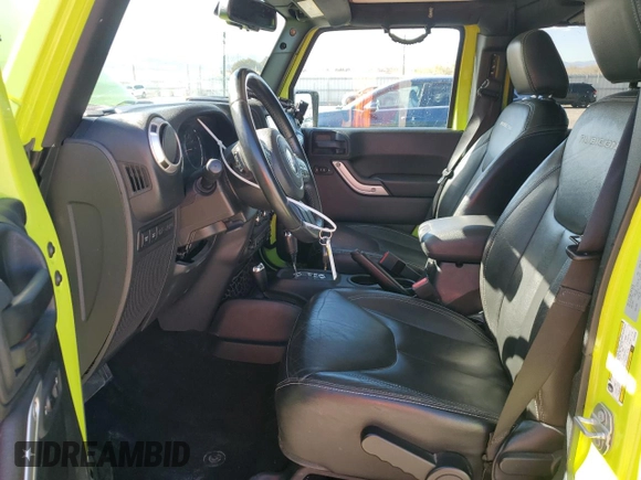 2016 Jeep Wrangler Unlimited Rubicon with VIN 1C4HJWFG2GL296235, listed as a Copart auction lot 50576595 with 60,076 mi miles and Salvage Title. Bid and sale history available at carsss.com. Image 7.