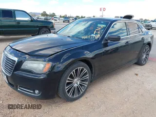 2014 Chrysler 300 S with VIN 2C3CCABG5EH205020, listed as a IAAI auction lot 42247180 with 186,458 mi miles and . Bid and sale history available at DreamBid. Image 2.