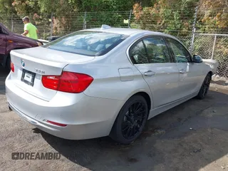2015 BMW 3 Series 328i with VIN WBA3A5G54FNS83410, listed as a IAAI auction lot 41942681 with 115,340 mi miles. Bid and sale history available at carsss.com. Image 4.