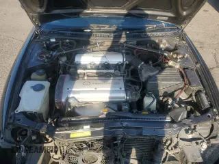1992 Toyota Corolla z VIN AE1015132757, wystawiony jako Copart lot #70678034 z przebiegiem 152 117 mil mil oraz Szkoda całkowita • Salvage title. Historia ofert i sprzedaży dostępna na DreamBid. Obrazek 11.