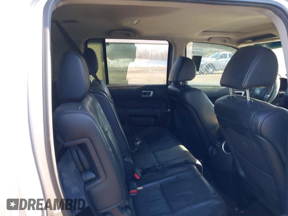 2013 Honda Pilot EX-L with VIN 5FNYF3H59DB015574, listed as a IAAI auction lot 38777512 with Not Provided miles and . Bid and sale history available at DreamBid. Image 8.