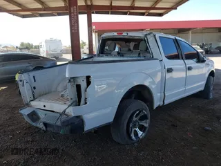 2015 Ford F-150 XLT with VIN 1FTEW1C81FKE76735, listed as a IAAI auction lot 41826968 with 160,530 mi miles and . Bid and sale history available at carsss.com. Image 4.
