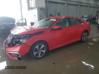 2020 Honda Civic LX z VIN 2HGFC2F60LH569330, wystawiony jako Copart lot #56819195 z przebiegiem 64 244 mil mil oraz Szkoda całkowita • Salvage title. Historia ofert i sprzedaży dostępna na DreamBid. Obrazek 1.