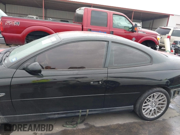 2004 Pontiac GTO z VIN 6G2VX12G84L183838, wystawiony jako IAAI lot #41946144 z przebiegiem 134 718 mil mil oraz . Historia ofert i sprzedaży dostępna na DreamBid. Obrazek 14.