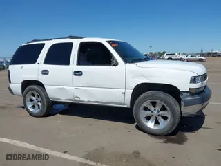 2001 Chevrolet Tahoe LT with VIN 1GNEC13T01J206365, listed as a IAAI auction lot 41960144 with 243,884 mi miles. Bid and sale history available at carsss.com. Image 13.